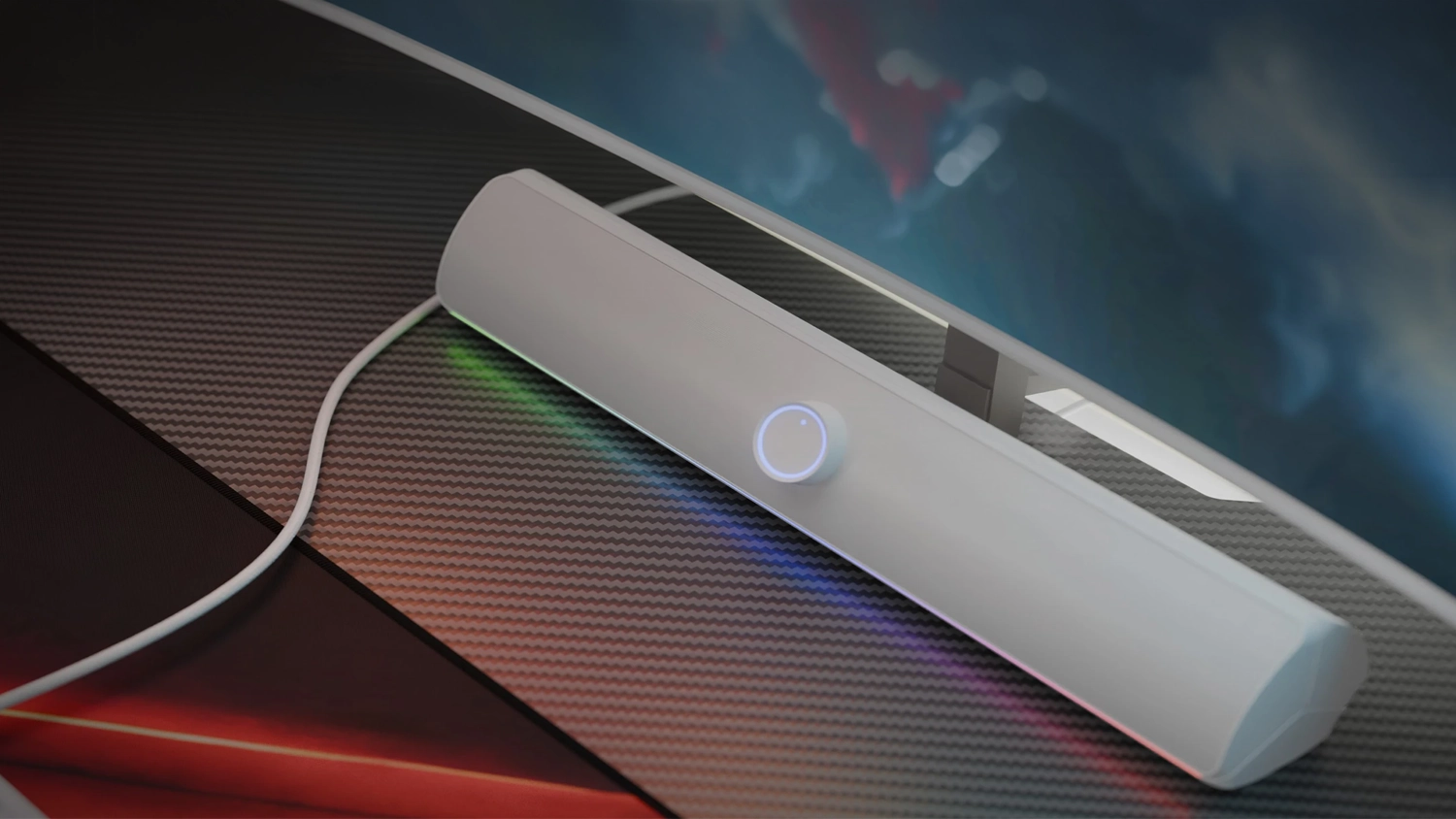 Soundbar GENESIS Helium 312BT bílý umístěný na stole pod monitorem