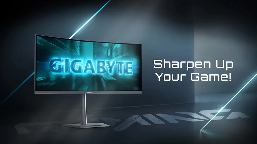 Monitor GIGABYTE na sivom pozad&iacute; s hern&yacute;m n&aacute;pisom