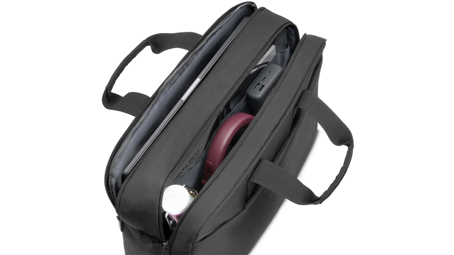 Polootvorená taška na notebook Hama Traveller s vecmi vo vnútri