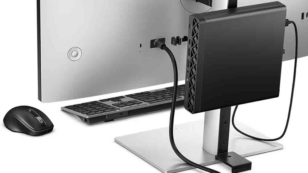 Stolní počítač HP EliteDesk umístěný na podstavci monitoru_03