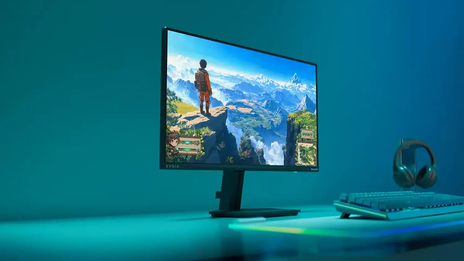 Hern&iacute; monitor Philips 24M2N3200NF na stole s kl&aacute;vesnic&iacute; a sluch&aacute;tky