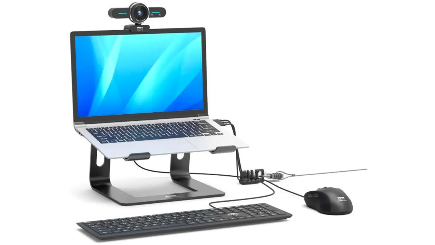 Kabelov&yacute; organiz&eacute;r Port Connect na stole vedľa notebooku