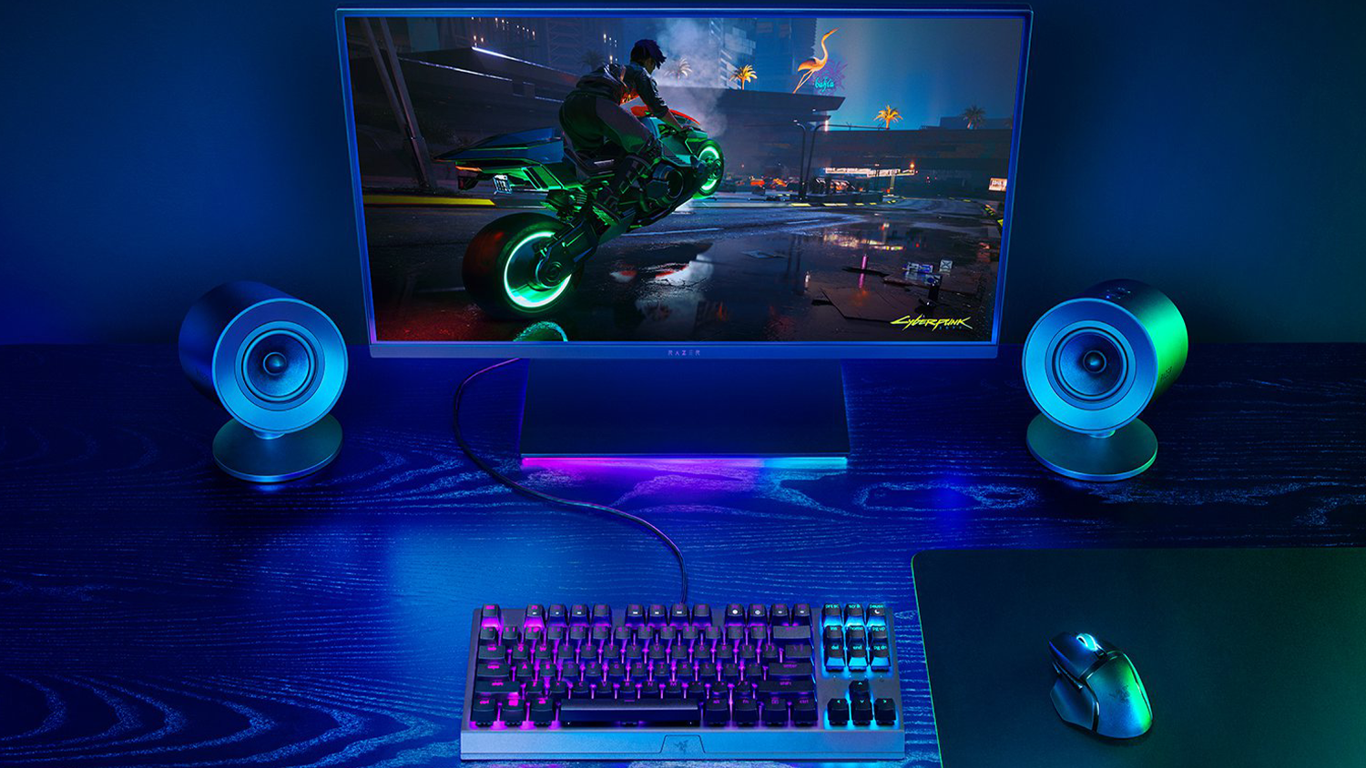 Reproduktory Razer Nommo V2 X u monitoru