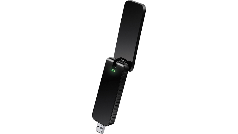 USB Wi-Fi adaptér TP-Link Archer T4U AC1300 na bílém pozadí zobrazující kompaktní design s připojením USB 3.0