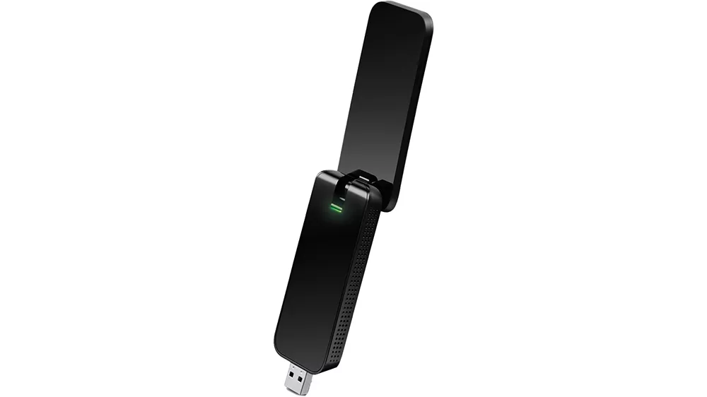 USB Wi-Fi adaptér TP-Link Archer T4U AC1300 na bielom pozadí zobrazujúci kompaktný dizajn s pripojením USB 3.0