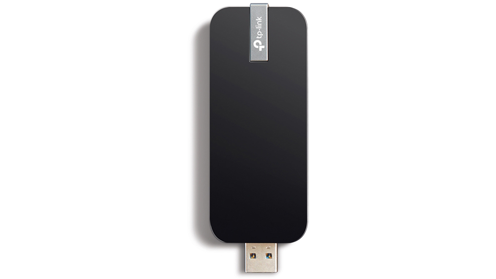 USB Wi-Fi adaptér TP-Link Archer T4U AC1300 demonstrující snadné zabezpečení pomocí WPS tlačítka a šifrování WPA2