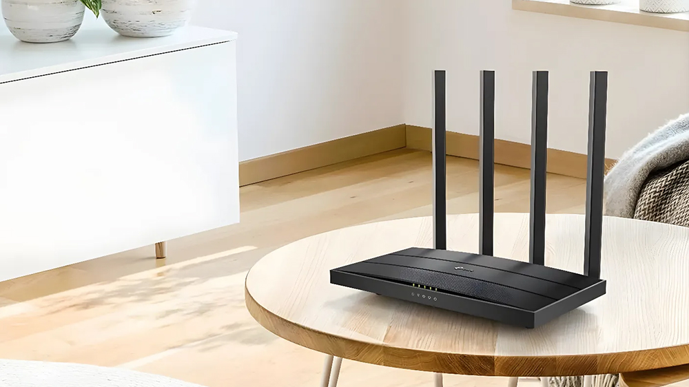 Stůl s routerem TP-Link Archer AX12_2