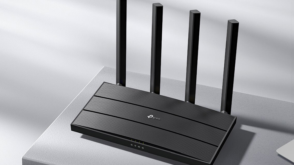 Stůl s routerem TP-Link Archer AX17_2