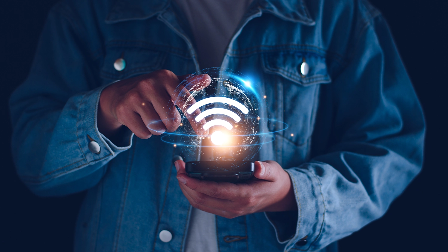 Muž s telefónom a ikonou Wi-Fi