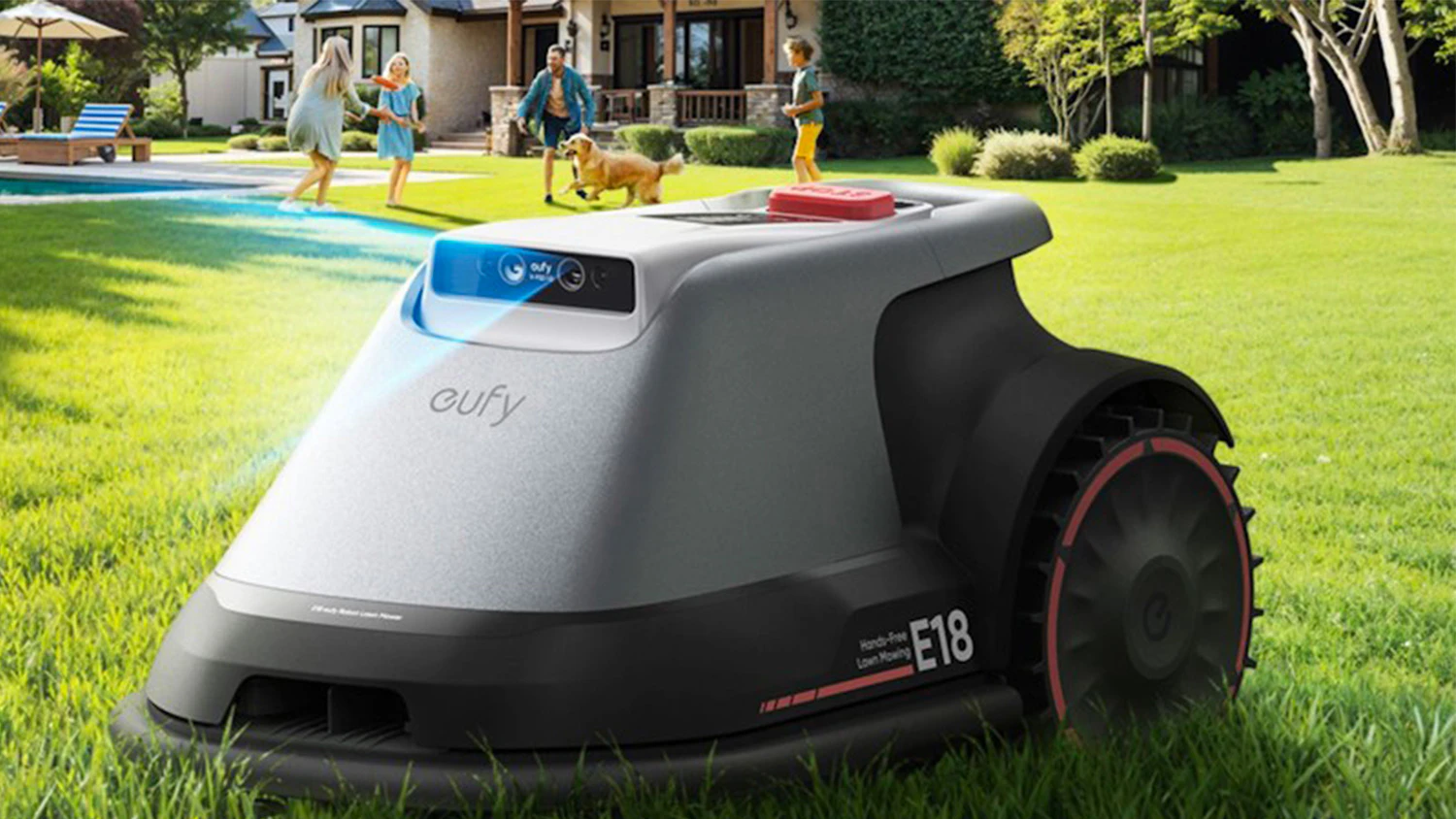 Robotická sekačka Anker Eufy E18, v pozadí rodina na trávníku