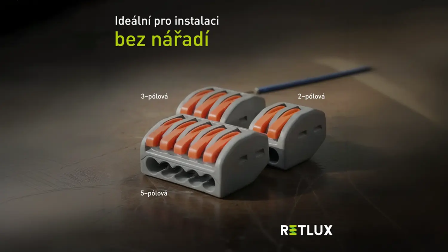 2-pólová, 3-pólová a 5-pólová svorka s páčkou Retlux RTB 101 na stole