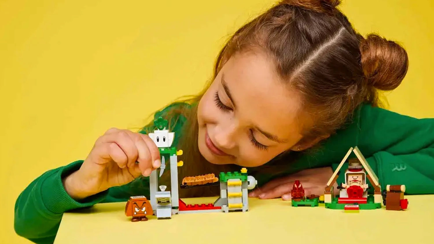 Dievčatko stavia kocky Captain Toad a jeho t&aacute;bor
