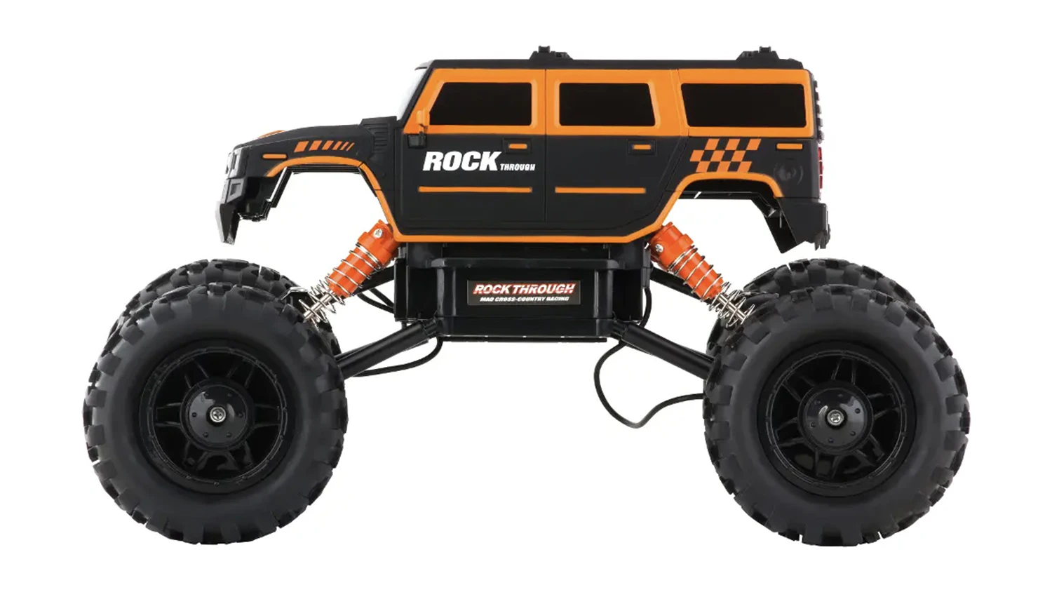 Terénní auto RC Buddy Toys BRC 14.613 při jízdě v náročném terénu demonstruje odolnou konstrukci s kovovými nápravami