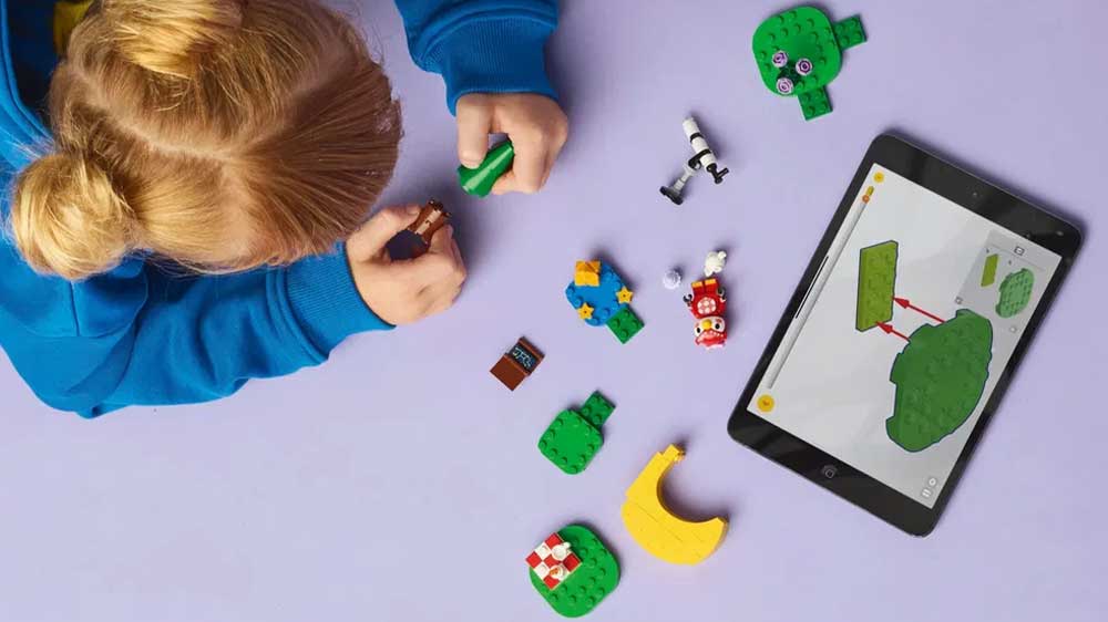 Stavebnice LEGO® Animal Crossing™ 77053 Pozorování hvězd s Celeste dívka staví Lego_02