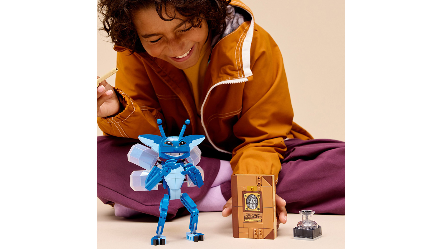 Dítě si hraje se stavebnicí LEGO® Harry Potter™ 76461 Cornwallský rarach