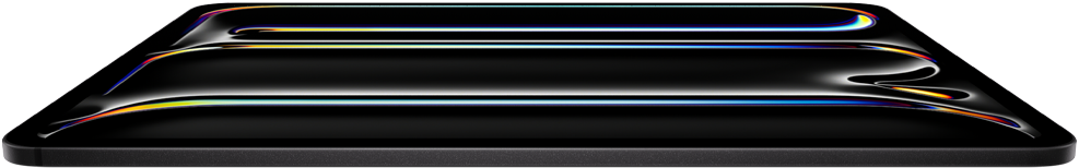 iPad Pro, pohled zepředu, vesmírně černá barva, tělo z hliníku a skla, tenký profil, nakloněný dozadu na displeji se zobrazuje grafika s pestrobarevnými čárami