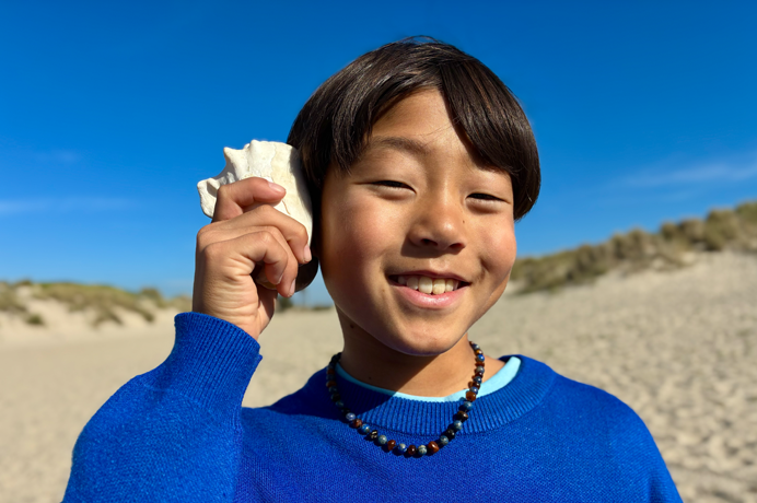 Fotka pořízená 48Mpx Fusion fotoaparátem, použití portrétů další generace, zaostření na obličej člověka