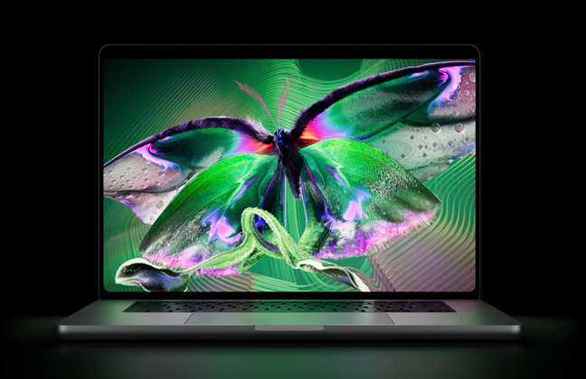 Otevřený stříbrný MacBook Pro s PROLED XDR displejem, na kterém je detailní, vysoce kontrastní obrázek s živými barvami, obrazovka osvěcuje klávesnici