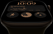 Apple Watch Series 12, pouzdro z tmavě bronzového hliníku, ciferník Modulární, komplikace: den a datum, Cvičení, kroužky aktivity, Hudba, na pravém boku korunka Digital Crown, olivový sportovní řemínek