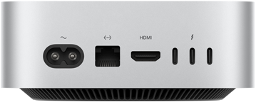 Pohled zezadu na Mac mini, napájecí zdířka, ethernetový port, port HDMI, tři porty Thunderbolt
