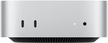 Pohled zepředu na Mac mini, dva porty Thunderbolt, stavová kontrolka a sluchátkový konektor, černá základna se zkosenými hranami, plochá horní strana, zaoblené boční hrany, rovné strany, stříbrná barva