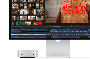 Mac mini spárovaný se Studio Displayem, vpravo na obrazovce je vidět úvodní záběr z filmu Black American Cowboy, vlevo několik statických snímků