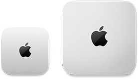 Pohled shora na dva Macy mini, stříbrný hliník, zakulacené rohy, uprostřed lesklé černé logo Apple, zařízení vlevo je novější verze a je o víc než polovinu menší než zařízení vpravo